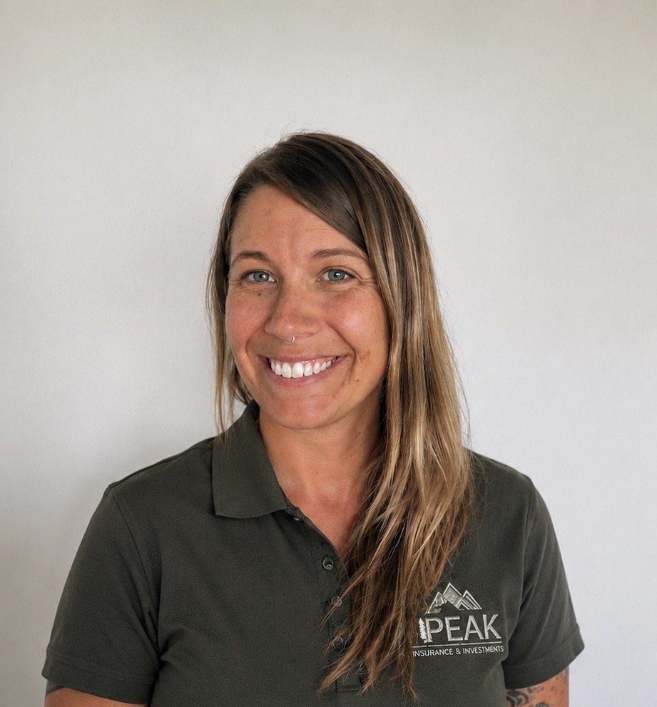 Your Peak Insurance & Investments broker, smiling in a branded polo.
